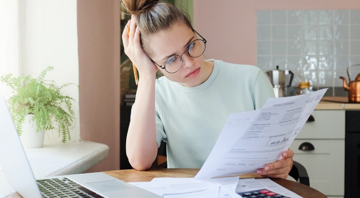 A woman trying to figure out when to use AGI and MAGI on her taxes.