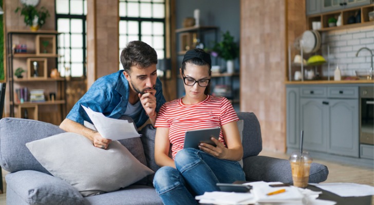 A couple keeping updated on recent debt ceiling developments.