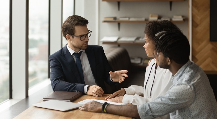 A financial advisor explains to clients how automated marketing will allow him to serve them efficiently.