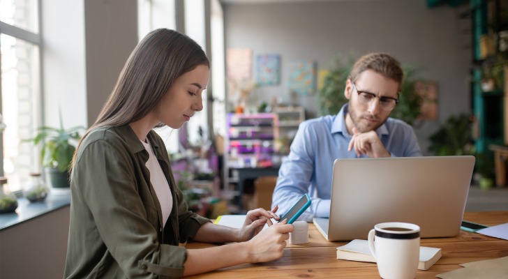 A couple reviewing an investment opportunity with a gap trading strategy.
