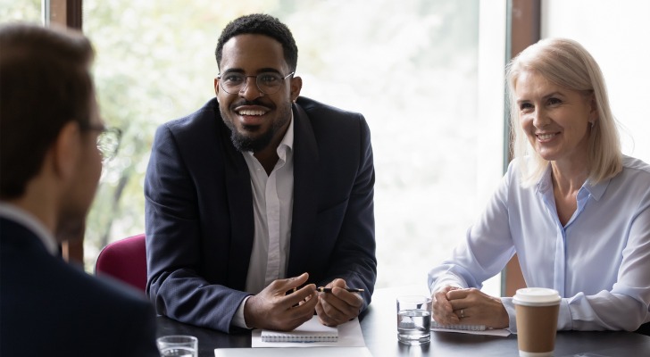 Financial advisors discussing how they could automate marketing for their firm.