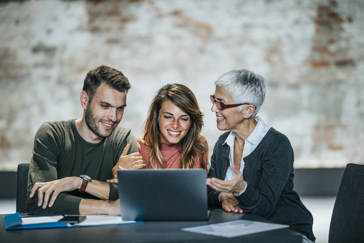 A financial advisor delivering on the services that she promised to clients in an elevator pitch.