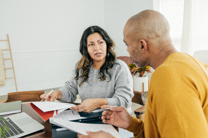 An independent financial advisor works with a client.