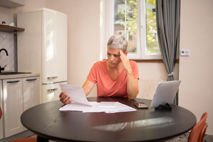 A taxpayer reviewing her estimated tax payments.