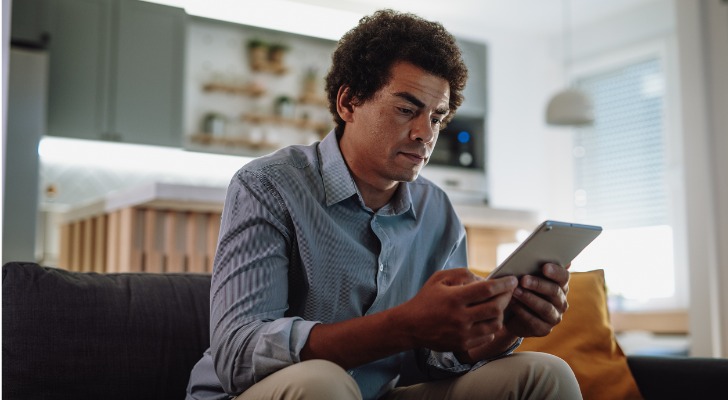 An investor reviews the applications requirements for options trading permission.