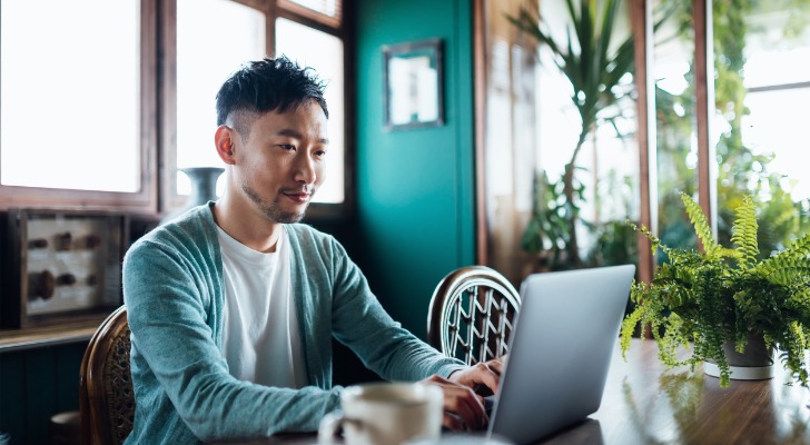 A self-employed worker reviewing rules to deduct contributions from his solo 401(k).