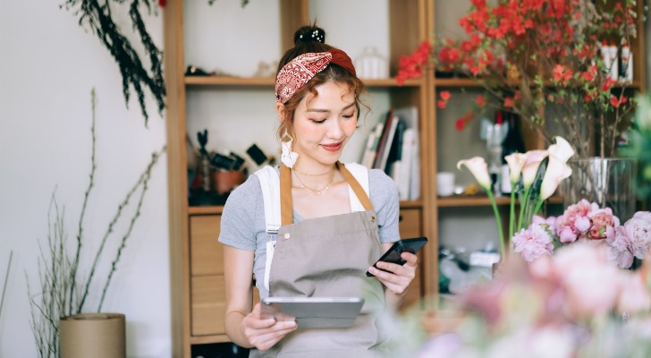 A small business owner checking tax requirements and deductions for a solo 401(k).