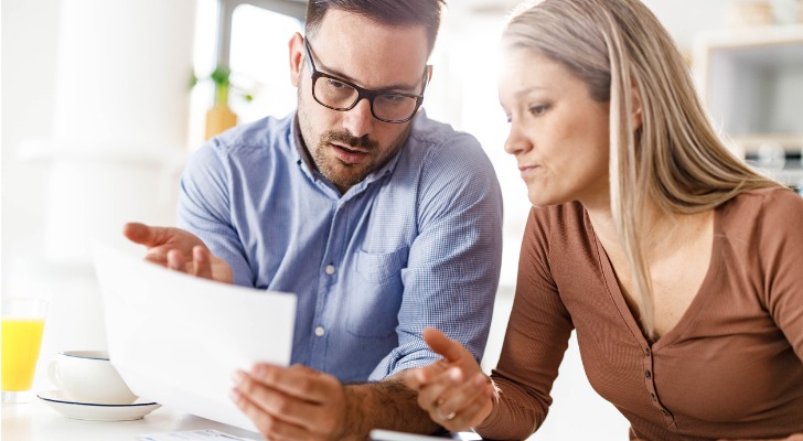 A couple estimating how much they will need to save to catch up on their retirement savings.