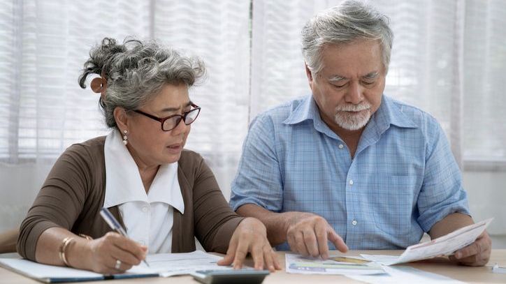 A retired couple considers converting their traditional IRA into a Roth account.