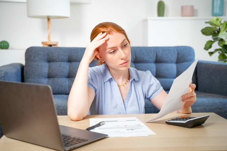 A woman estimating her taxes for 2025.