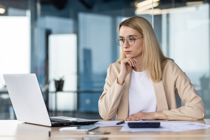 A financial advisor researching regulations that ensure industry standards.
