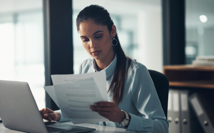 A financial advisor reviewing industry regulations.