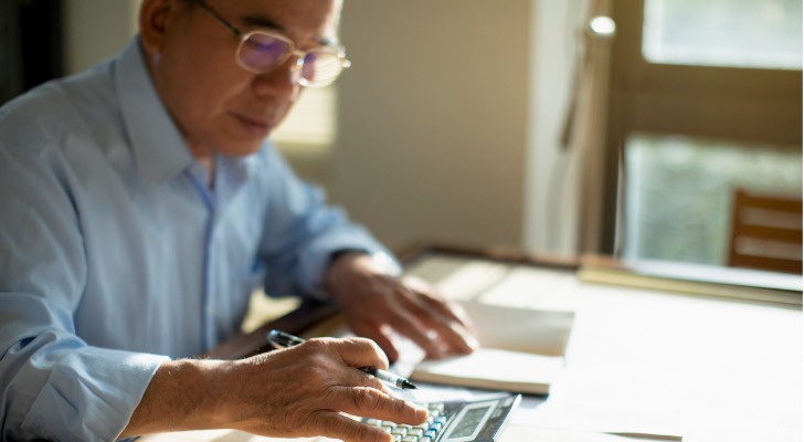 A retiree calculates the capital gains taxes that he'll owe when he sells his home.