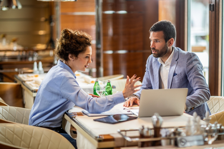 Financial advisors reviewing the phases for their client onboarding checklist.