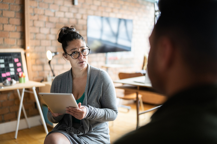 A couple discussing the benefits of building a bond tent for when they get closer to retirement.