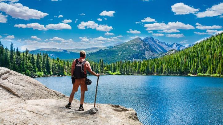 A man thinks about his estate plan while enjoying the Colorado view.