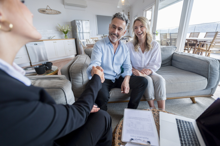 A financial advisor meeting with high earners who are not rich yet (HENRY).