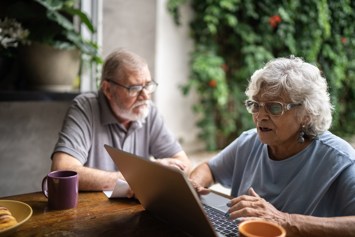 A senior couple researching how to set up a durable power of attorney.