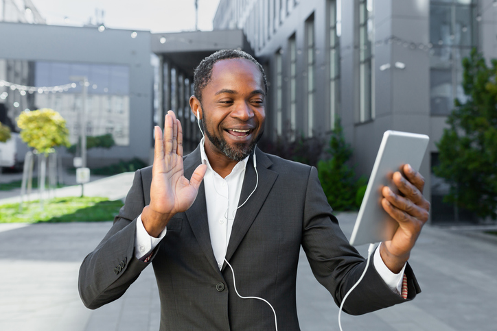 A financial advisor setting up a first meeting with a potential client.