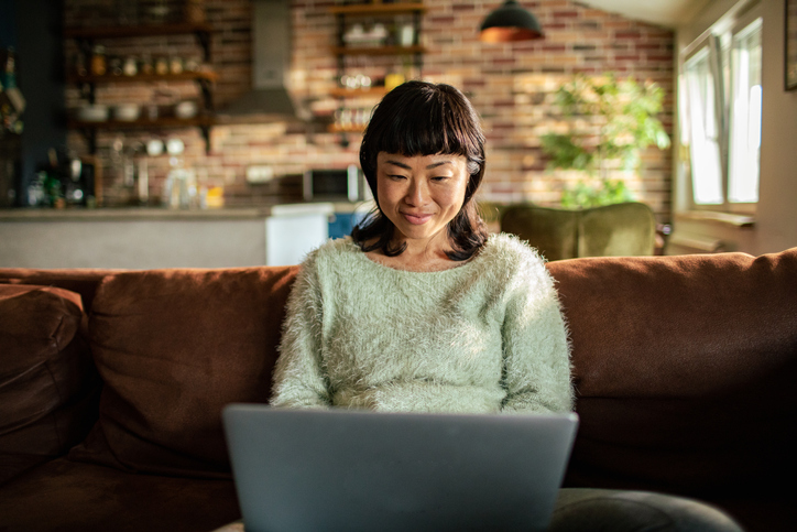 A woman researching how to build a bond tent to protect her retirement investments.