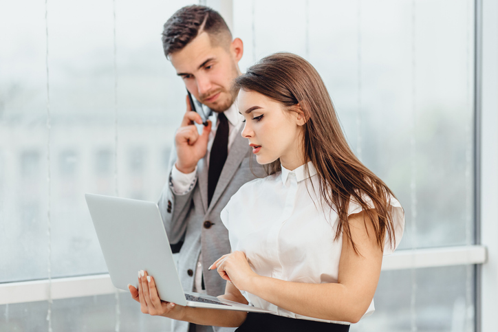 Financial advisors discussing front, middle and back office functions for their advisory firm.