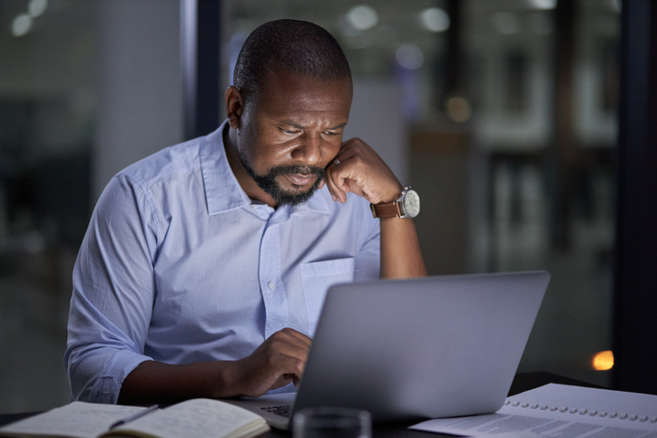 A financial advisor keeps up with industry trends by reading blogs from financial influencers or "finfluencers."