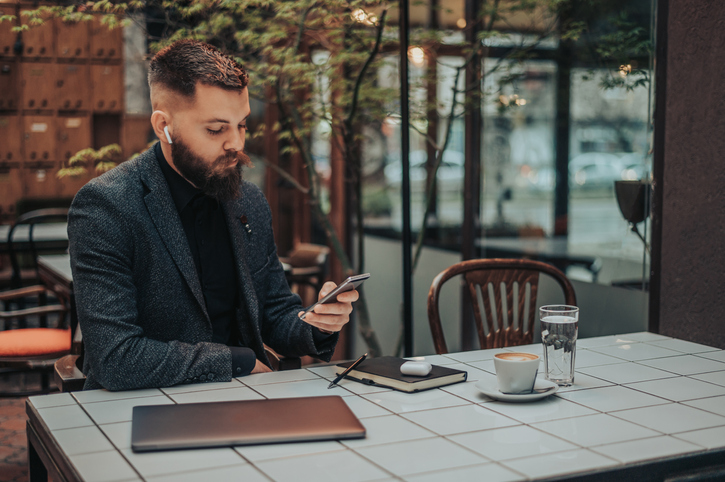 A man researching entry-level jobs in the wealth management industry.