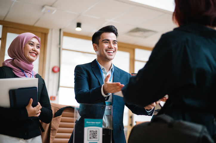 A registered investment advisor (RIA) meeting with clients.