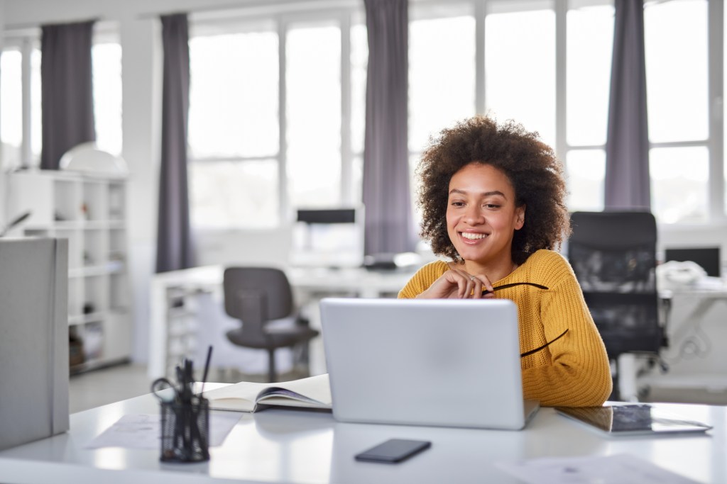 A woman rolling over an old health savings account (HSA) to a new one.