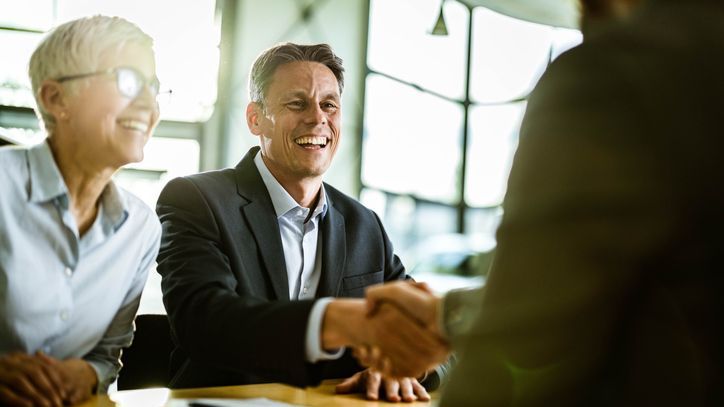 A married couple agrees to purchase a business together.