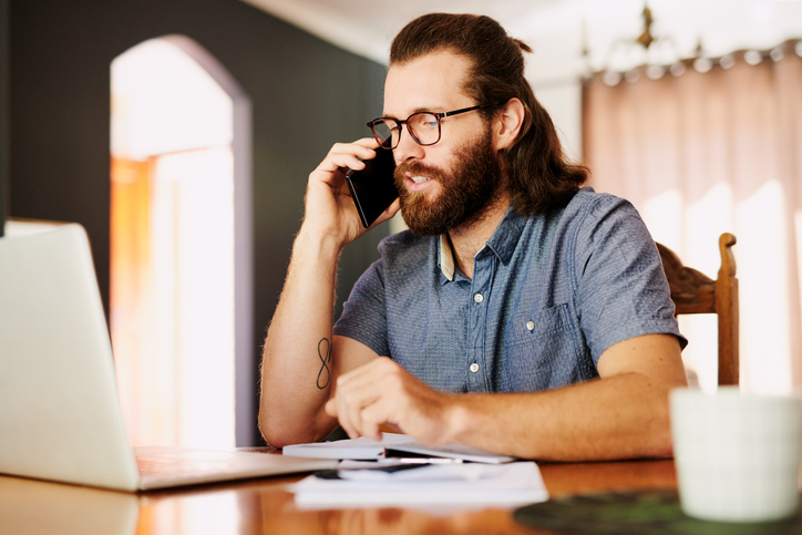 A man looking up imputed interest tax rules.