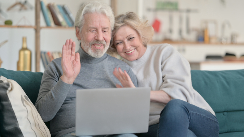 A senior couple speaking with a court-appointed conservator who will manage the affairs of a family member.
