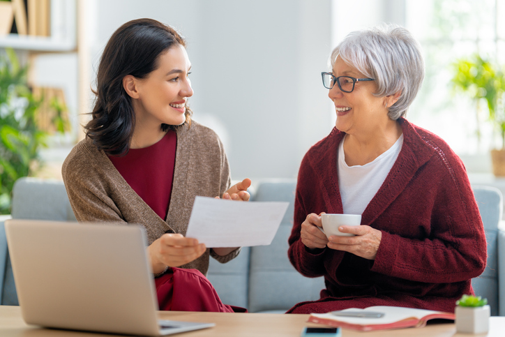 A mother and daughter calculating the interest for a gift loan.