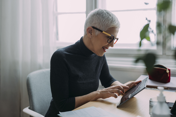 A woman looking up the cost of probate in Florida.