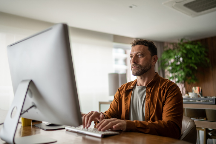A man researching retirement planning tips.
