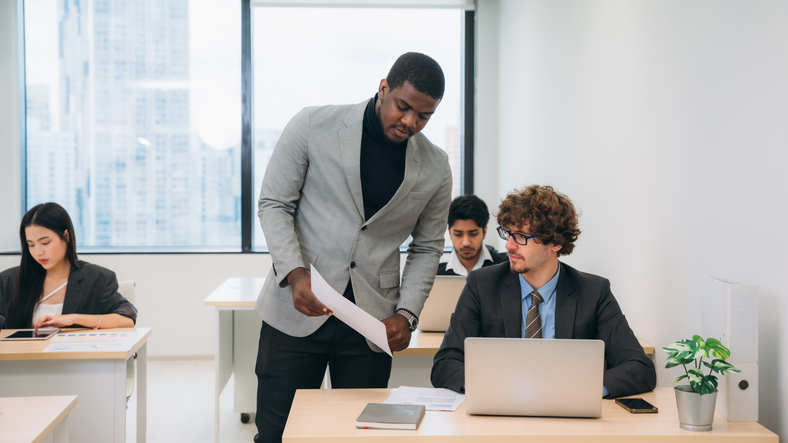 Financial advisors implementing strategic portfolio management.