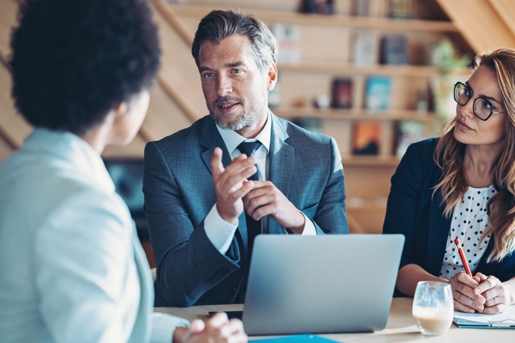 Advisors discussing what to include in a code of ethics.