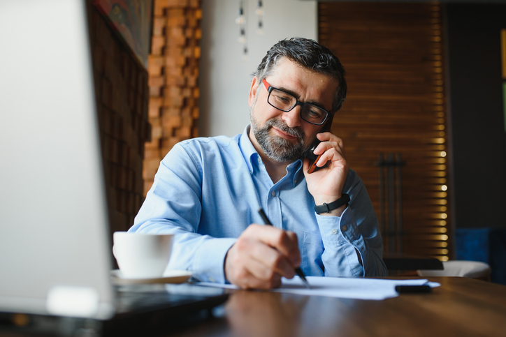 A man reviewing his pension maximization strategy to potentially boost the retirement income he could receive.