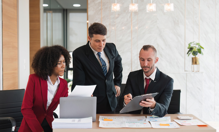 Financial advisors looking up the rules for reportable securities.