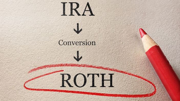 A Roth conversion requires you to pay income taxes on your pre-tax assets while moving them to a Roth IRA.