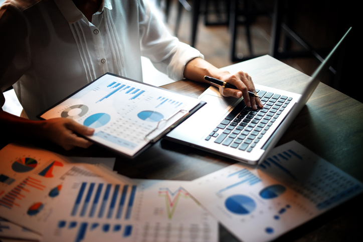 An investor comparing expense ratios for different mutual funds.