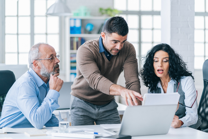 Clients meeting with a financial advisor to discuss setting up a transfer on death deed.