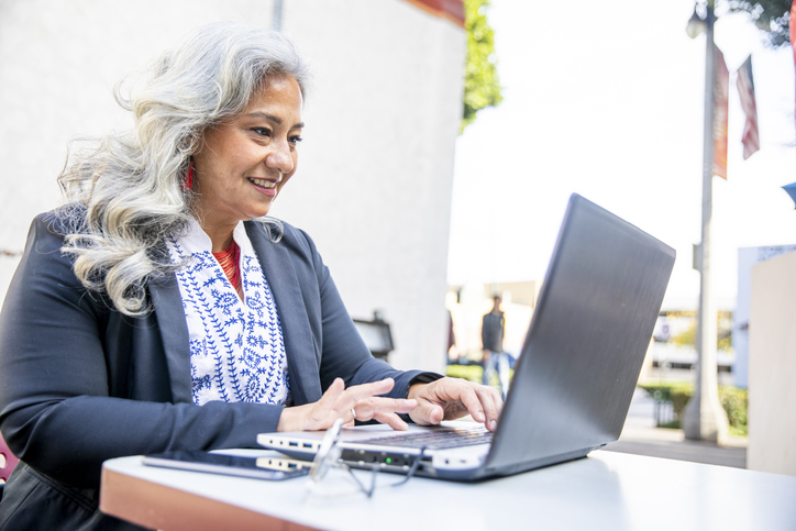 A senior woman creating an estate plan online.