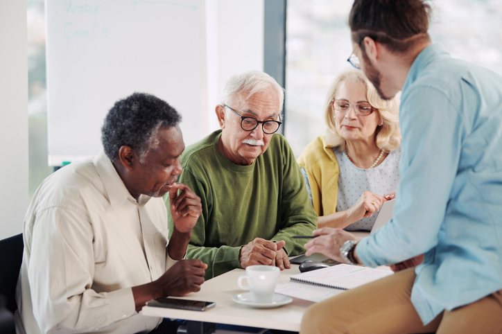 A financial advisor explaining to clients how an HSA works.