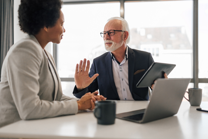 Advisors reviewing a client motivation strategy.