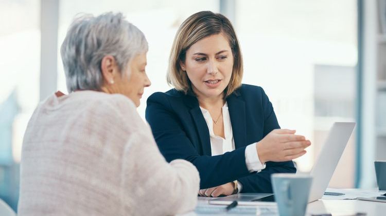 An estate planning attorney explains how NING trusts work to a client who's interested in establishing one.