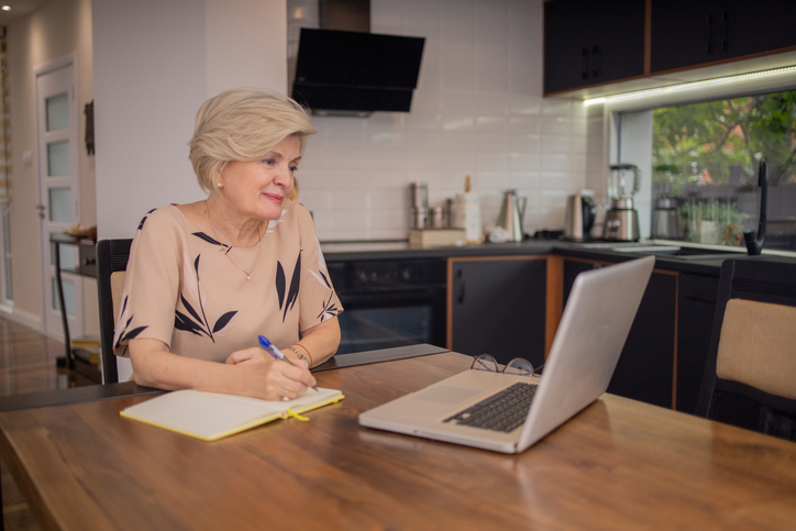 A woman researching how to create a living will.