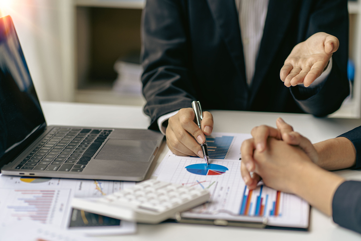 Financial advisors developing different sales pitches for clients.