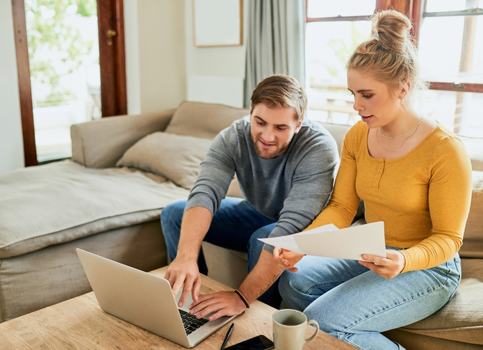 A couple looking up the uses for a durable power of attorney form in Iowa.