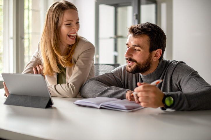 A couple researching the requirements for a power of attorney in Arkansas.